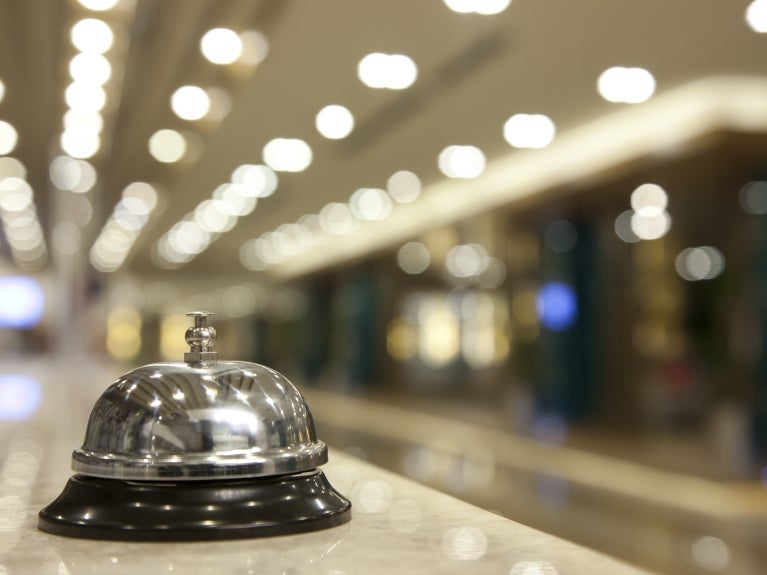 bell on front desk at hotel