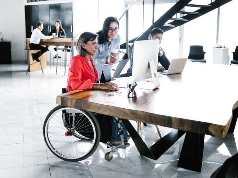 Disabled worker in office setting