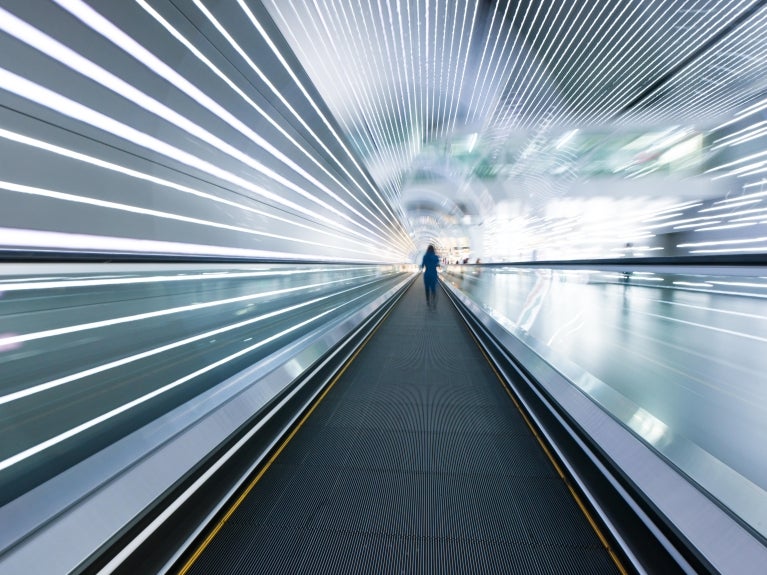 Person on moving sidewalk
