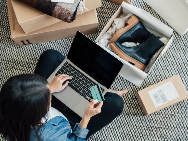 Woman entering card information online