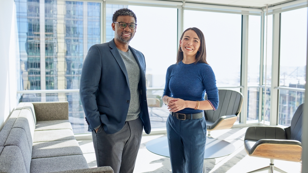 Two firm employees in an office