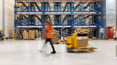 girl in warehouse walking