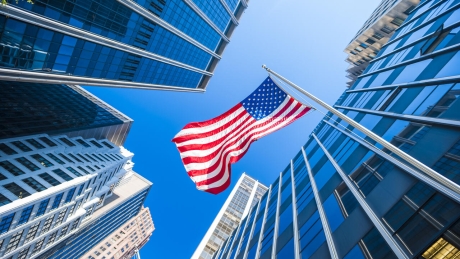 Flag hanging from corporate building