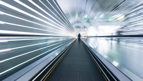 Person on moving sidewalk