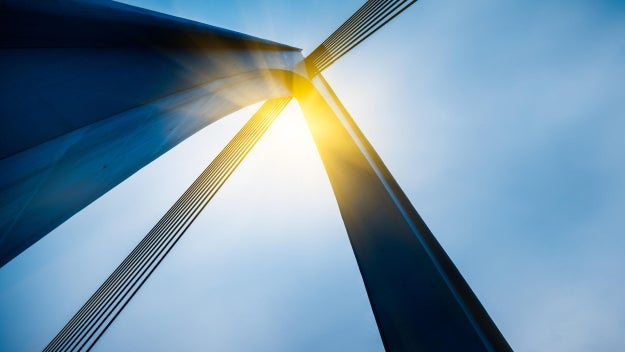 Arch with sun shining through