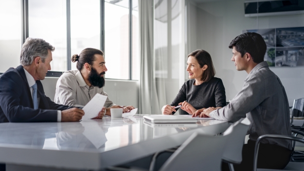 Trust & Estates Planning, people around a table in an office 