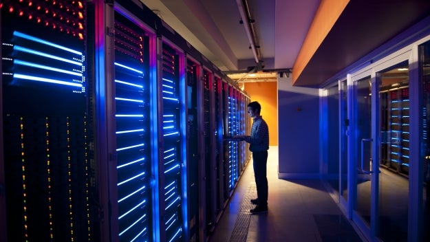 Man standing in computer server room