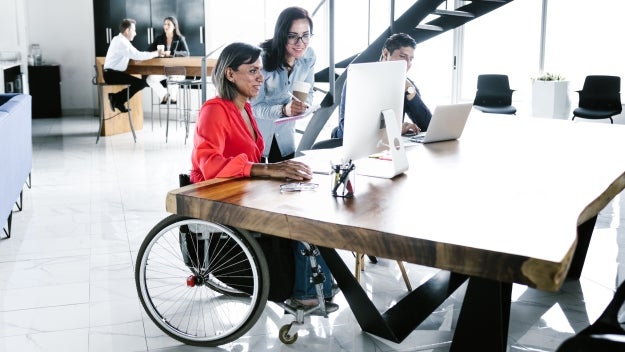 Disabled worker in office setting