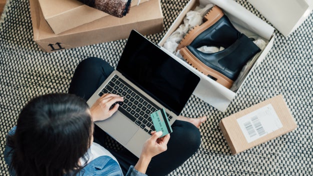 Woman entering card information online